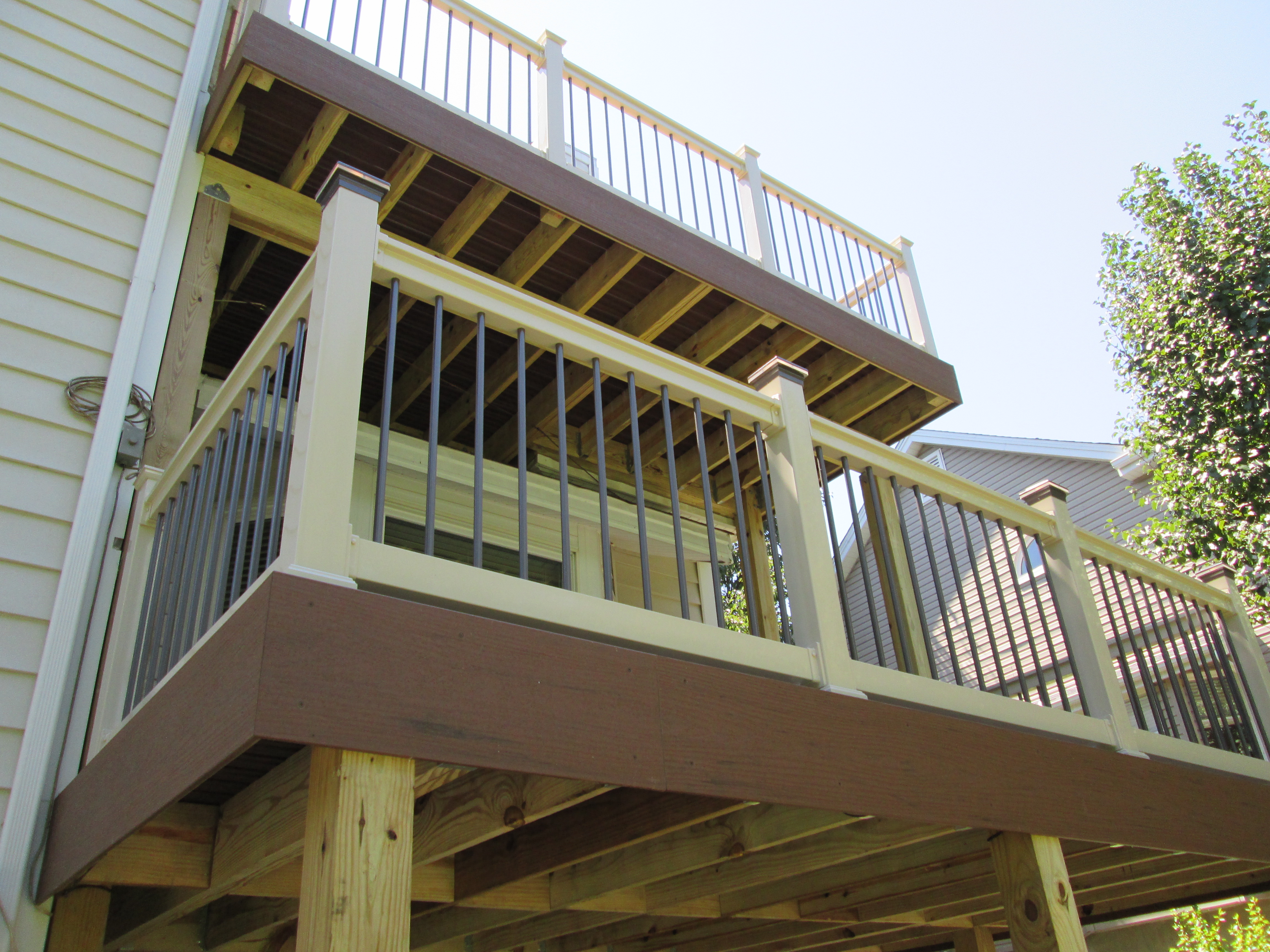 elevated two story deck designed for safety and style by archadeck st louis mo